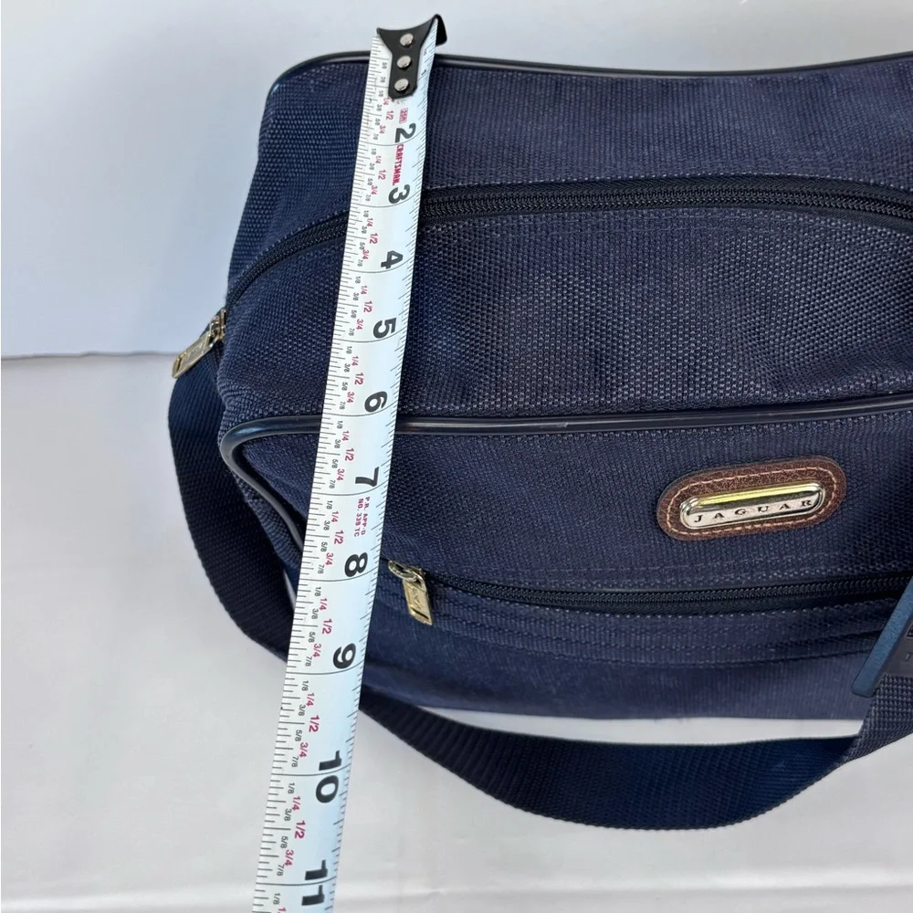 Jaguar Blue Travel Bag with Durable Fabric and Leather Accents. Nice Condition!